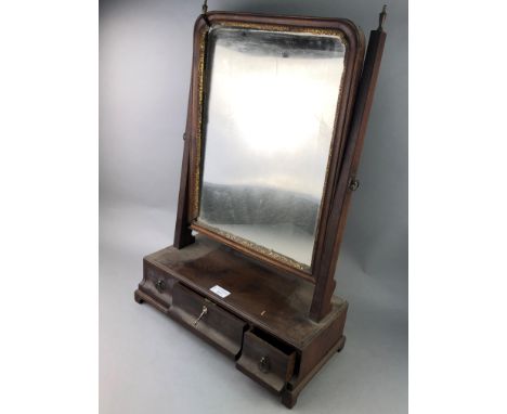 19TH CENTURY MAHOGANY DRESSING MIRROR, 42cm wide, along with an early 20th century mantel clock (2)