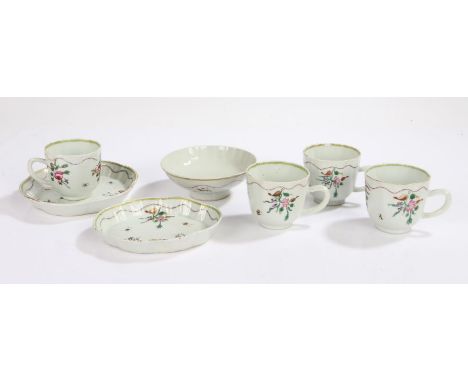 Four 19th Century Chinese porcelain cups, with three various matching dishes, all painted with floral sprays within a gilded 