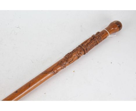 French carved wooden walking stick, carved with depictions of a stonemason surrounded by his tools, a carpenter holding a pla