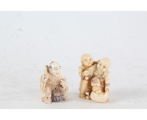 Two Japanese Meiji period carved ivory netsuke, the first in the form of street vendor holding fish, character mark to base, 