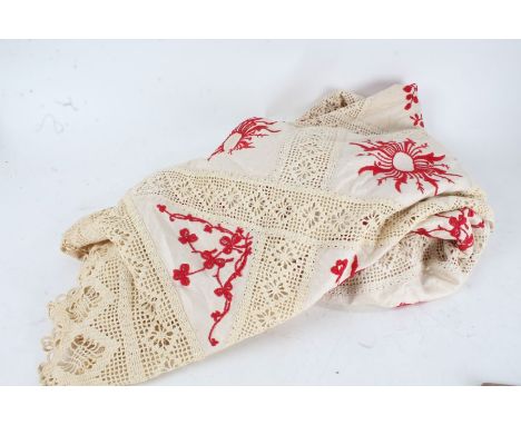 Mixed textiles, to include a lace and linen table cloth with red floral embroidery, three other lace and linen table cloths (