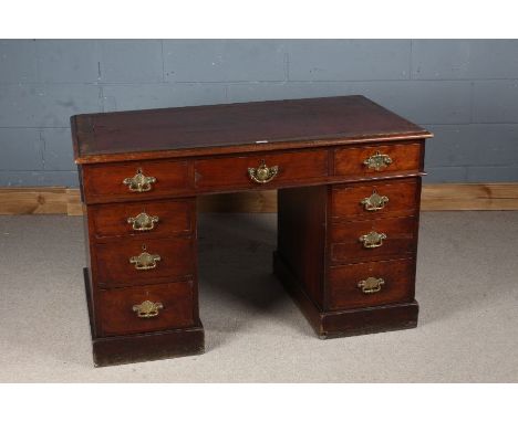 Military interest early 20th Century mahogany pedestal desk, the rectangular top with a tooled red leather inset, above three