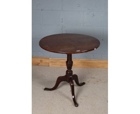 George III style oak tilt-top table, the circular top raised on a turned stem with tripod legs and pad feet, 70cm diameter