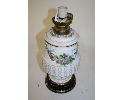 Victorian porcelain oil lamp (converted to electricity), the lift out font above a lattice body overlaid with flowers, with p