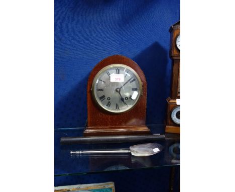 AN EDWARDIAN MAHOGANY CASED MANTEL CLOCK a mother of pearl spoon with a metal handle and an ebony ruler (3)