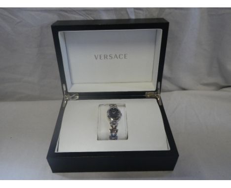 VERSACE: A Lady's stainless steel wristwatch with quartz movement, black dial, diamond numerals and silver hands with origina