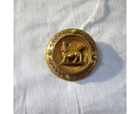 AN UNMARKED YELLOW METAL ETRUSCAN STYLE BROOCH with seed pearl decoration 