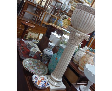 A CHINESE FAMILLE ROSE PLATE, another similar, a Jardiniere on stand, similar ceramics, a carved Oriental tray and a soapston