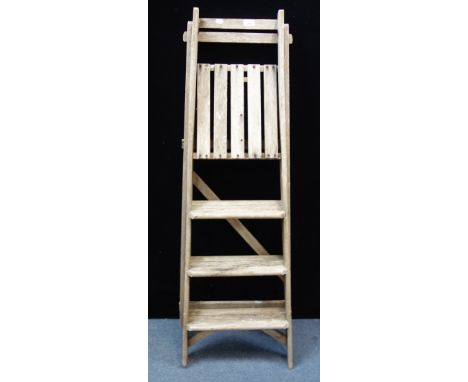 A SET OF VINTAGE WOODEN STEP LADDERS