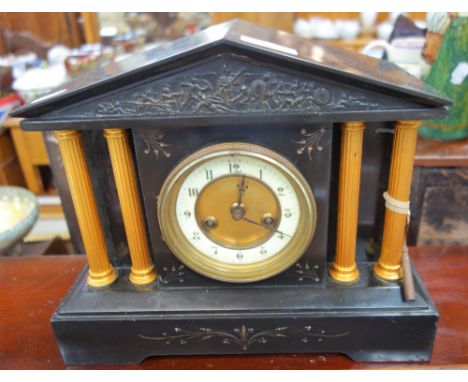 A 19TH CENTURY SLATE CASED MANTEL CLOCK of architectural form