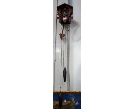 A VINTAGE CUCKOO CLOCK (working)