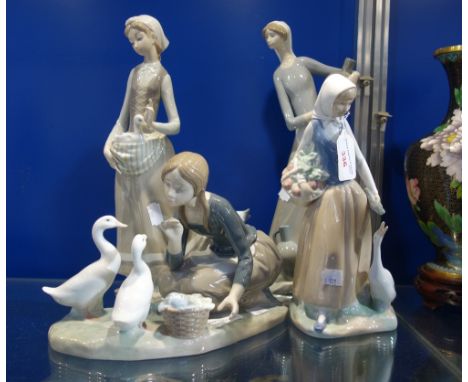 A LLADRO STUDY OF A GOOSE GIRL WITH GEESE, two similar Lladro women and another by Nao (4)