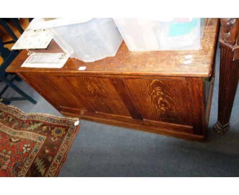 A GEORGE III MAHOGANY AND CROSSBANDED DEMI-LUNE CARD TABLE, 90cm wide, and an Edwardian oak coffer, 120cm wide