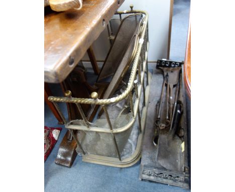 A VICTORIAN BRASS FIRE GUARD, another similar and a collection of fire tools and similar items