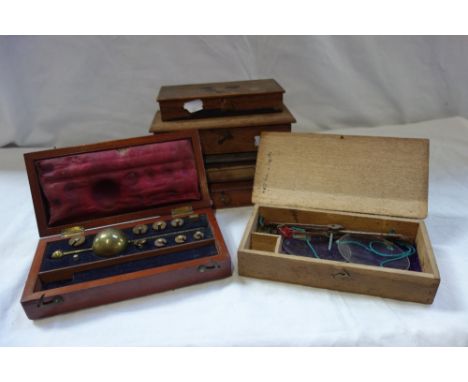 A WOODEN CASED SET OF POSTAL SCALES, and a collection of similar items