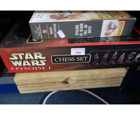 A "STAR WARS" EPISODE 1 CHESS SET,  an African cast metal chess set in a suede box and a Britannia boxed game (3)