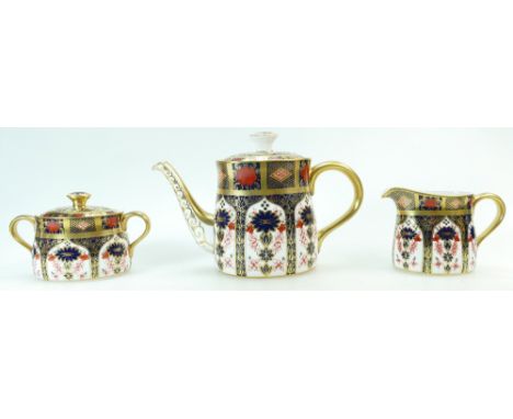 Royal Crown Derby Teaset decorated in the Old Imari 1128 design comprising Teapot, covered sugar and milk jug, teapot height 