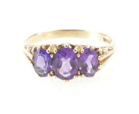 9ct Gold ladies dress ring set with 3 Amethyst stones, size N, 2.6 grams