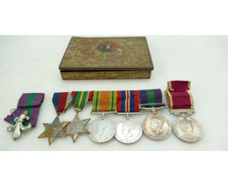 A group of medals awarded to 3530229 Pte S Williams. Manch comprising The Defence medal, Victory medal, 1939-1945 star, The P