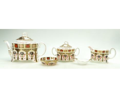 Royal Crown Derby Imari teaset comprising ram teapot, covered sugar bowl, milk jug and tea strainer, all items boxed (4)