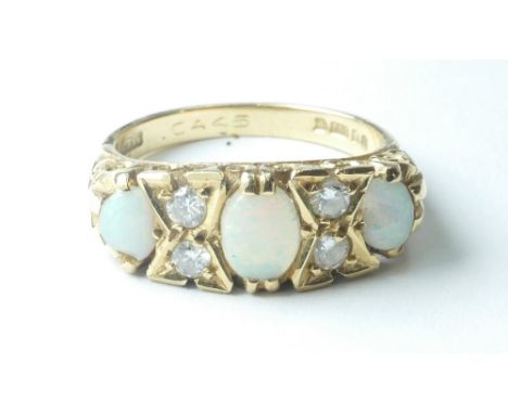 18ct gold Opal & Diamond set Victorian style ring, chip to one opal size N.  6.2g.  With accompanying Safeguard valuation for