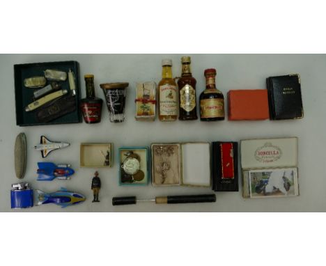 A good job lot containing old whisky and other miniatures, lead soldier figure, vintage knives and cigar cutter, jewellery, C