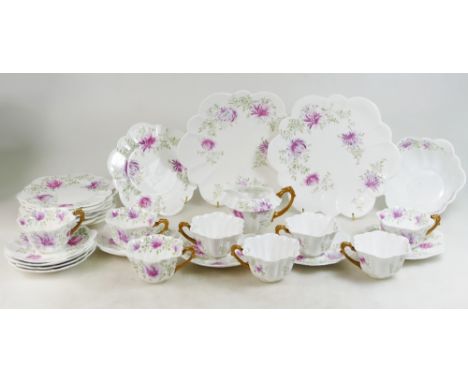 Wileman pre Shelley, Foley China a collection of tea ware in the Snowdrop shape in a lilac floral design (28)