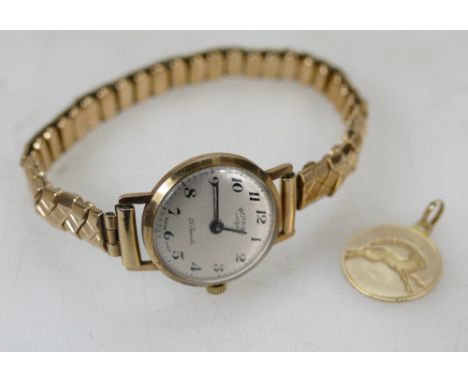9ct ladies Rotary wristwatch with 9ct back & front bracelet and 9ct pendant, total weight 19.5 grams (2)