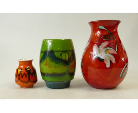 A collection of Poole Pottery vases to include mottled orange, green etc (height of tallest 21cm) (3)