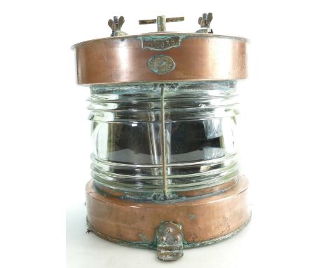 Mid 20th century copper & brass ships lamp 38cm high.  Wired for electricity, will need checking for safety.