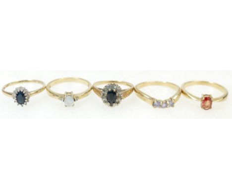 5 x 9ct Gold rings - 4 x size N, last item size K - Orange Sapphire, Aquamarine, 3 stone, smaller cluster, Larger cluster  - 