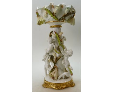 Moore Brothers large centrepiece decorated with various cherubs around a tree trunk with painted and gilded foliage, height 4