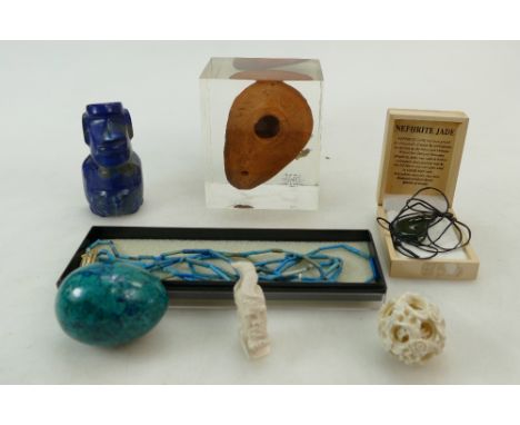 A collection of items including a Jade necklace, Ancient Byzantine oil lamp, carved ivory ball and bust, Lapis Lazuli Aztec b