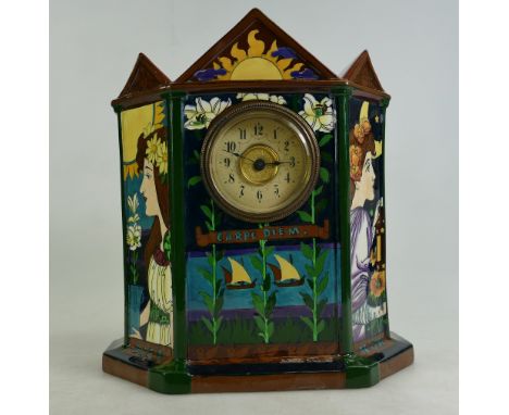 A Foley pottery 'Intarsio' clock, circa 1900, designed by Frederick Rhead, the cream circular chapter ring with black Arabic 