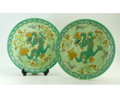 Pair Charlotte Rhead Crown Ducal chargers decorated in the Manchu design, diameter 32cm (2)