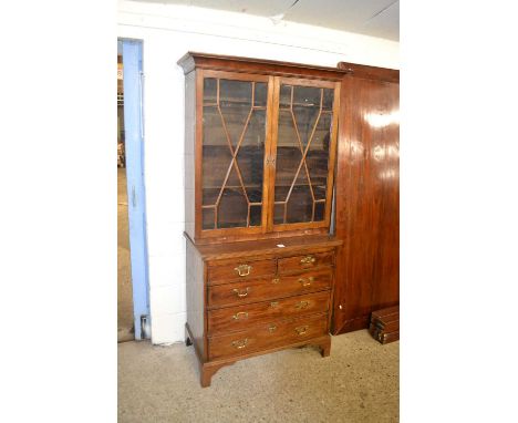 Mahogany glazed bookcase with two short and three long drawers with panel glazed doors above, 97cm wide