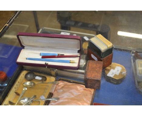 Case of Patience playing cards marked Mundie &amp; Sons, Piccadilly together with an enamel mounted pencil and similar pen pl