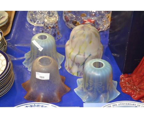 Four early 20th Century glass light shades, various designs