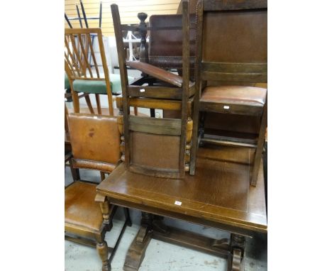 VINTAGE OAK DRAW-LEAF DINING TABLE on baluster legs, 88 x 84cms, together with a set of four early Ercol leatherette and stud