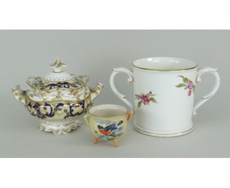 ROYAL WORCESTER PORCELAIN LOVING CUP having scroll handles with a gilt detail, the body decorated with blossom branch, togeth