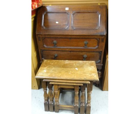 VINTAGE OAK DROP DOWN BUREAU with two drawers on raised turned legs, 102cms tall x 76cms wide, together with an oak nest of t
