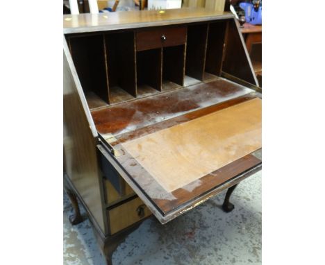 VINTAGE DROP DOWN BUREAU with three drawers on raised ball and claw feet