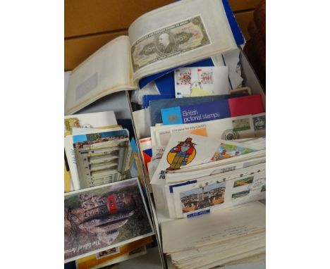 BOX CONTAINING STAMP ALBUMS, first day covers, postcards ETC