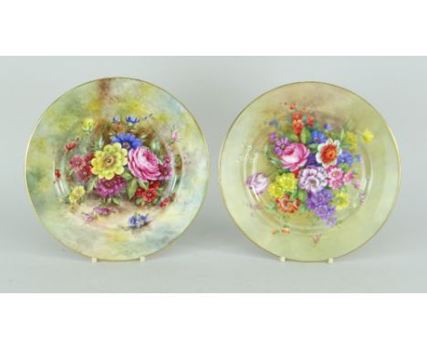 PAIR OF ROYAL WORCESTER FLORAL DECORATED PLATES signed by E Barker and Freeman respectively, both with full spray of centred 