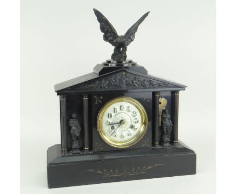 A VICTORIAN BLACK SLATE MANTEL CLOCK of classical architectural form with Emperor figures and Eagle finial, the circular dial