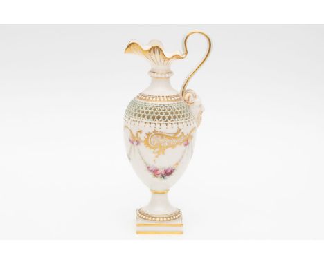 a royal Worcester reticulated ewer. The flower decoration is likely H.Chair. Circa 1900