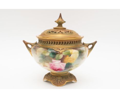 A royal Worcester pot-pourri and cover circa 1905 signed Taunt. Approximately 15.5cm in height.