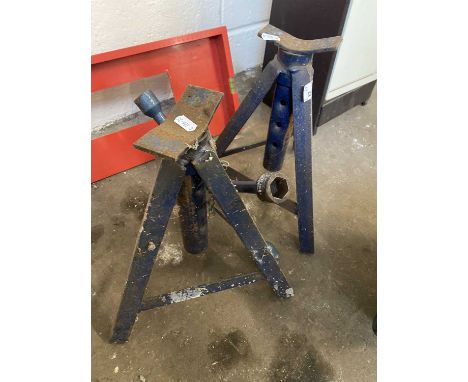 Two metal car A frames and a four spoke spanner