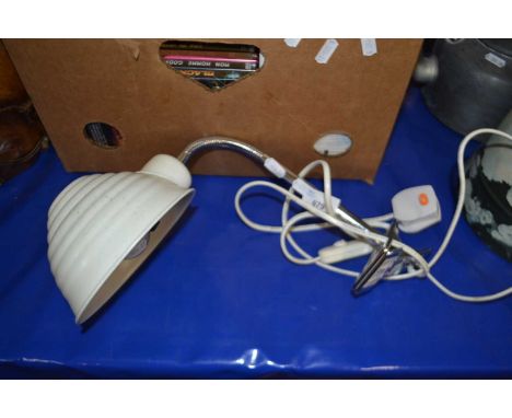 A retro styled adjustable desk lamp