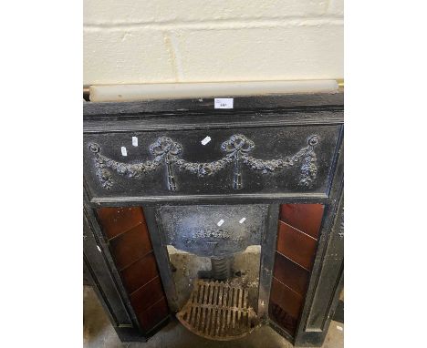 Cast iron and tiled fire surround with grate, overall approx 95cm wide